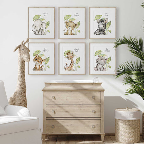Neutral safari nursery wall art set with leafy green animal prints and positive sayings