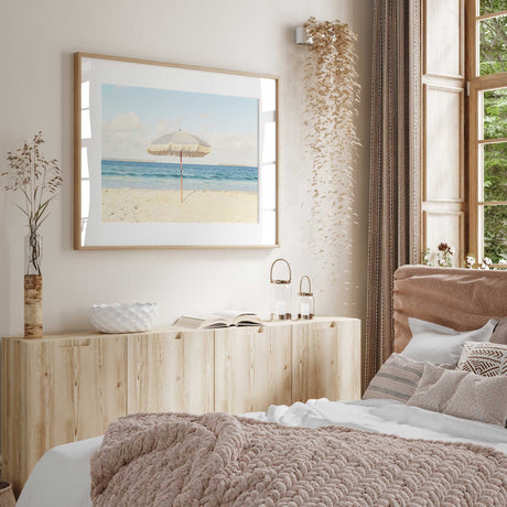 Neutral-toned summer ocean print with a beach umbrella, ideal for modern home decor.