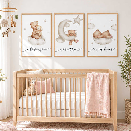 Three neutral teddy bear prints showing a bunny hug, a bear on a crescent moon and a sleeping bear on a cloud.