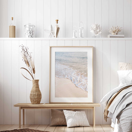ocean shoreline coastal print showing gentle wave foam on beach sand