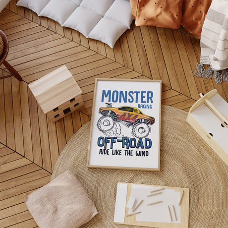 Off-road monster truck artwork showing an orange and yellow truck, blue Monster Racing text and Ride Like the Wind slogan.