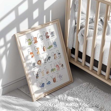 Soft and playful animal alphabet art print featuring pastel letters and illustrated animals