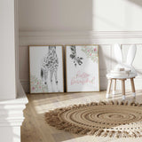Pastel giraffe girls room art with gentle black and white giraffe, floral branches and hello beautiful wording.