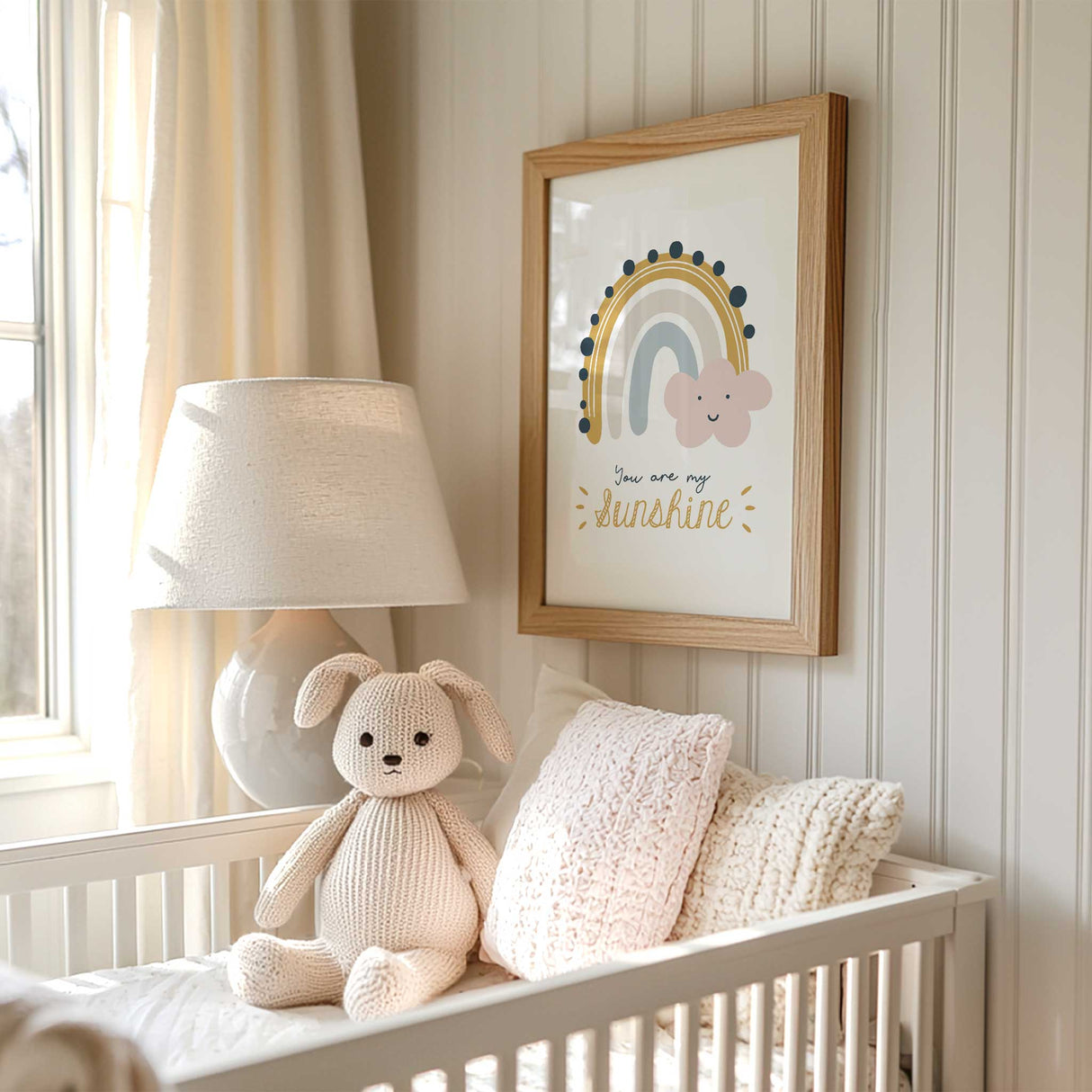 Pastel rainbow nursery wall art print featuring smiling cloud and sunshine phrase