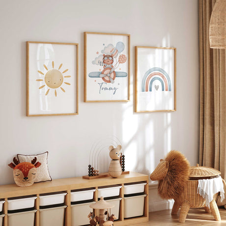 personalised airplane nursery wall art set with sun name and rainbow prints