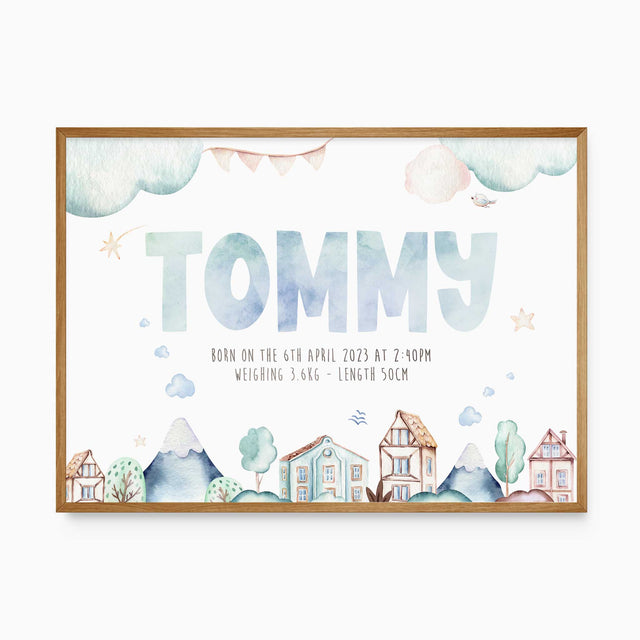 Personalised baby boy birth print with name and birth details featuring blue houses mountains clouds and stars for nursery wall art