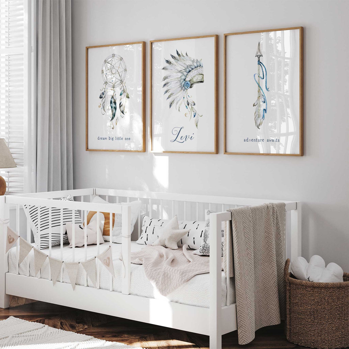 Personalised baby boy nursery wall art in blue grey and neutral tones with name and feather artwork