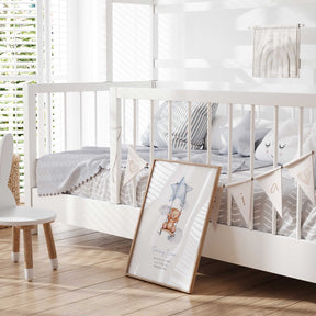 Blue star baby boy nursery print featuring teddy bear and clouds