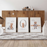 Three personalised bear prints with a ride-on car bear, grey initial and name with balloon bear, and pilot bear.