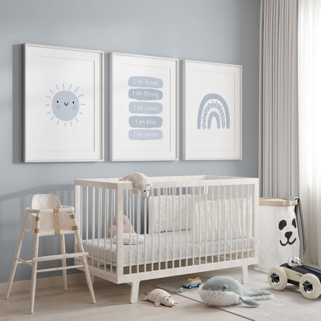 Personalised boys affirmation wall art set with name print, smiling sun and rainbow for a nursery or kids bedroom in blue