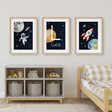 Set of three space-themed nursery prints: astronaut, personalized moon, and rocket.