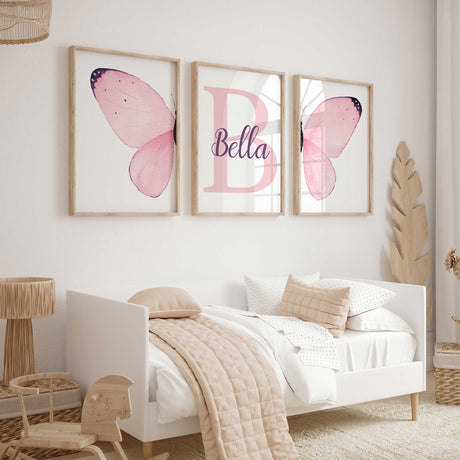 Personalised butterfly nursery wall art set with pink watercolour wings and name print