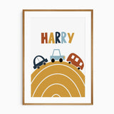 personalised car print with multicoloured lettering and three vehicles above a mustard curved road on white.
