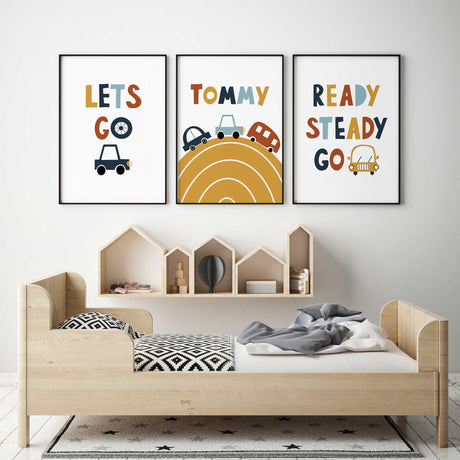 Personalised car print set with Tommy above a mustard road, plus Let's Go and Ready Steady Go designs on white.