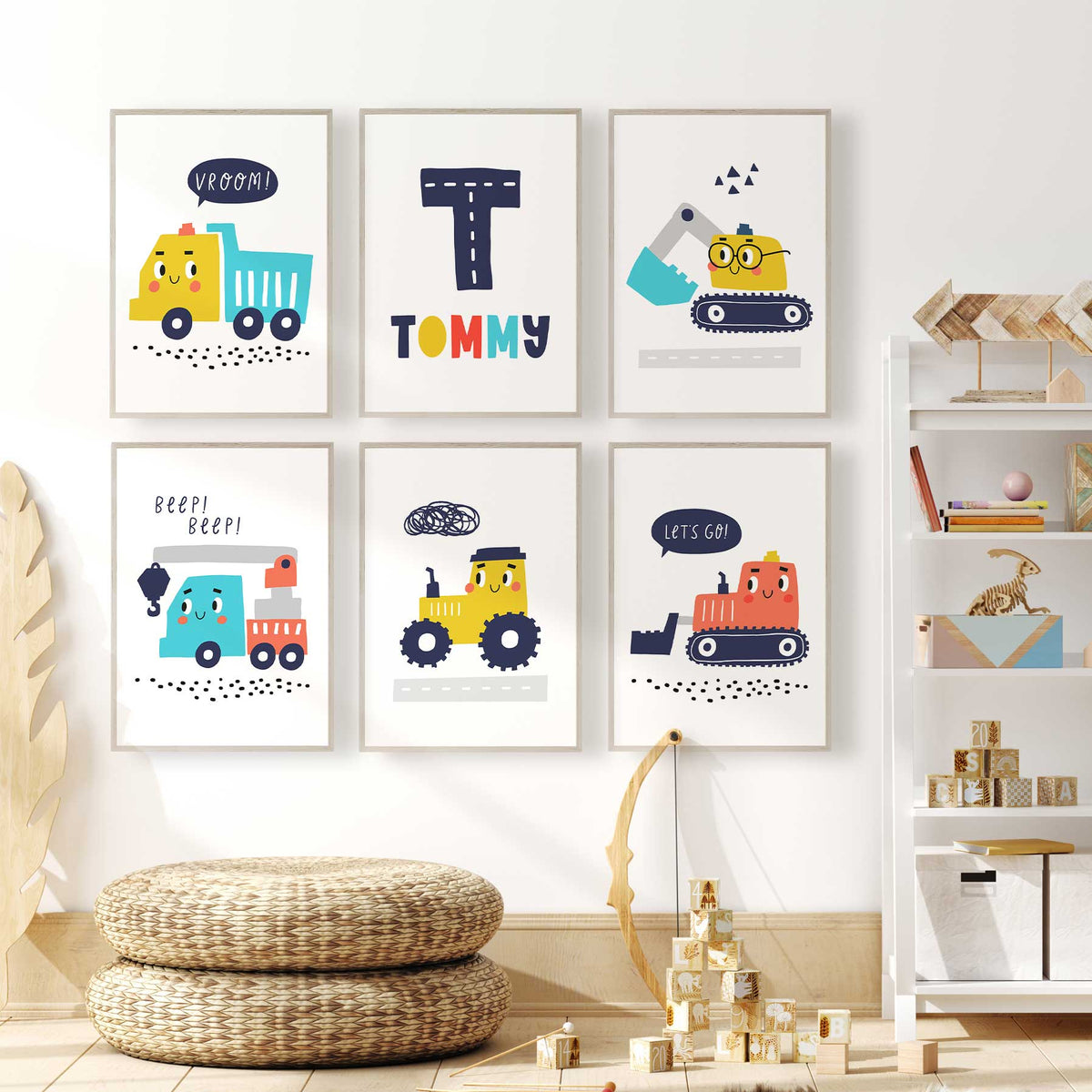 Set of six personalised cartoon construction prints with five smiling vehicles, a navy road initial and colourful name.