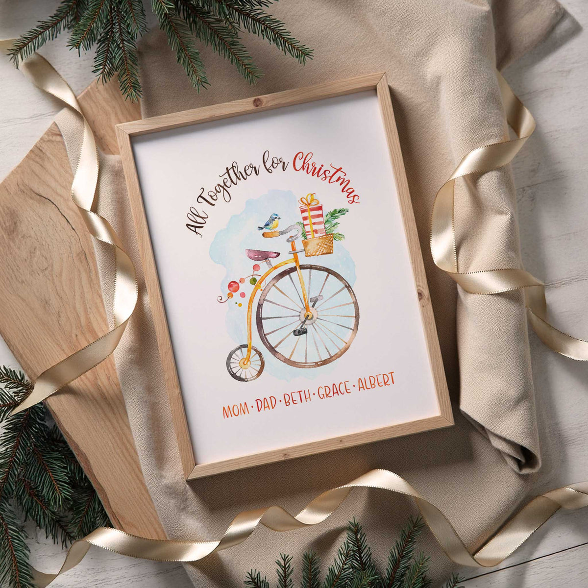 Personalised Christmas print showing a bicycle, festive presents and bird, with the chosen family names printed along the bottom