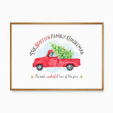 Personalised Christmas print with a family name above a red vintage truck carrying a decorated tree and a festive quote