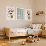 Personalised construction wall art set with trucks and custom name print for a boys bedroom or nursery.