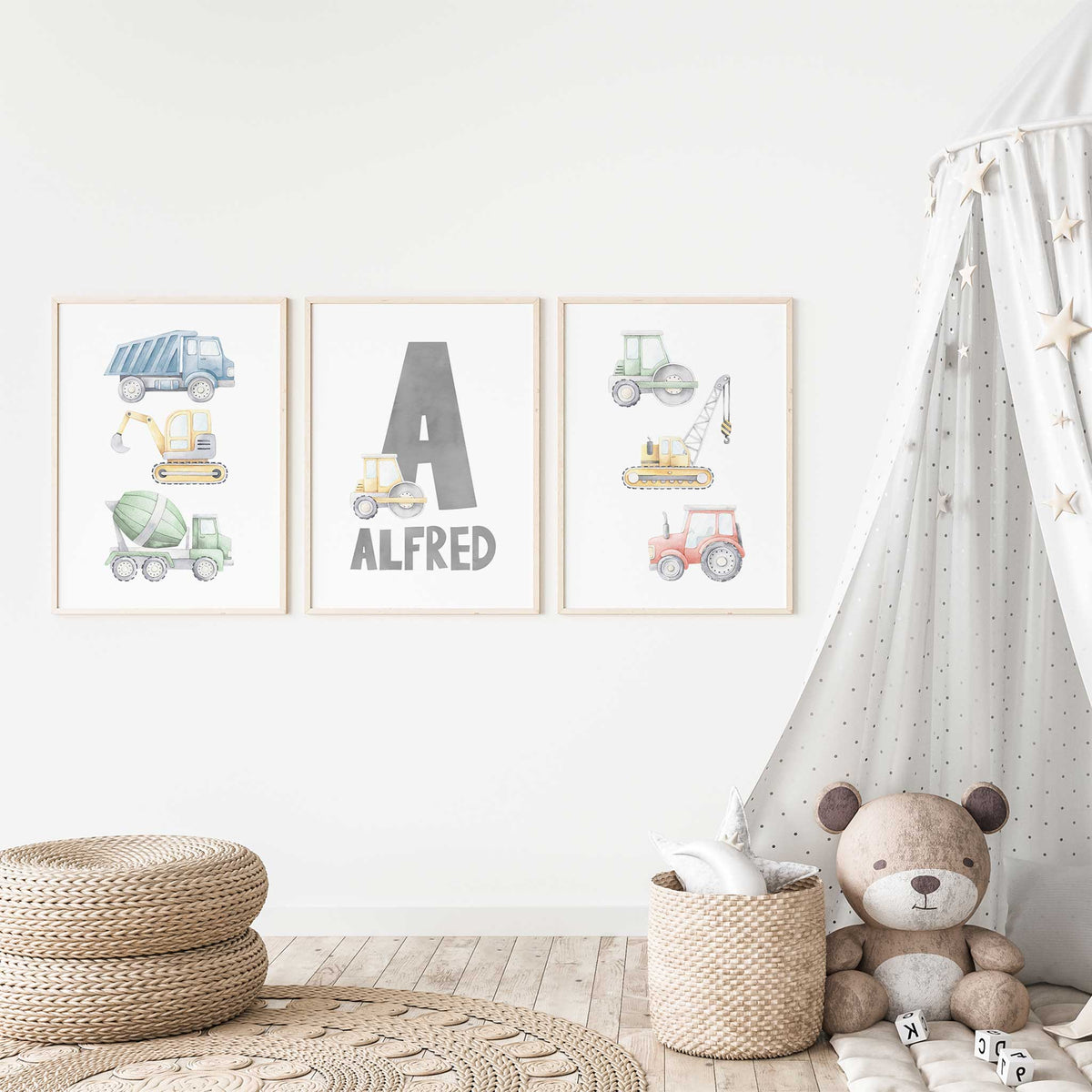 Three personalised construction prints with watercolour vehicles and a grey initial and nam on white backgrounds.