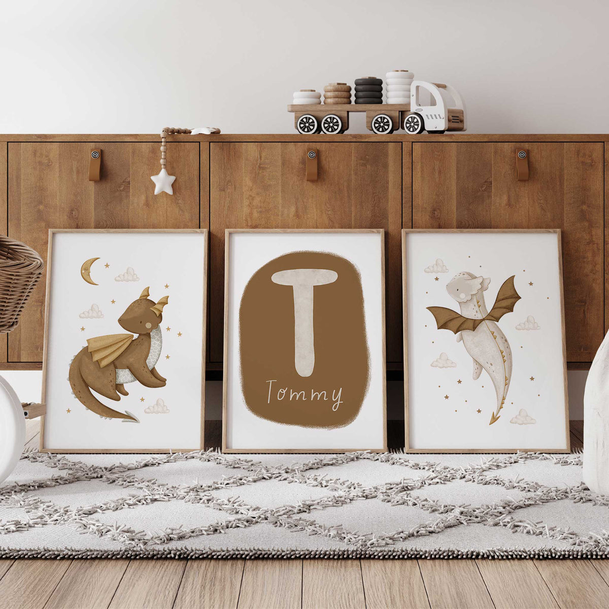 Personalised dragon prints set of three with brown and cream baby dragons, stars, clouds and a custom name and initial design.