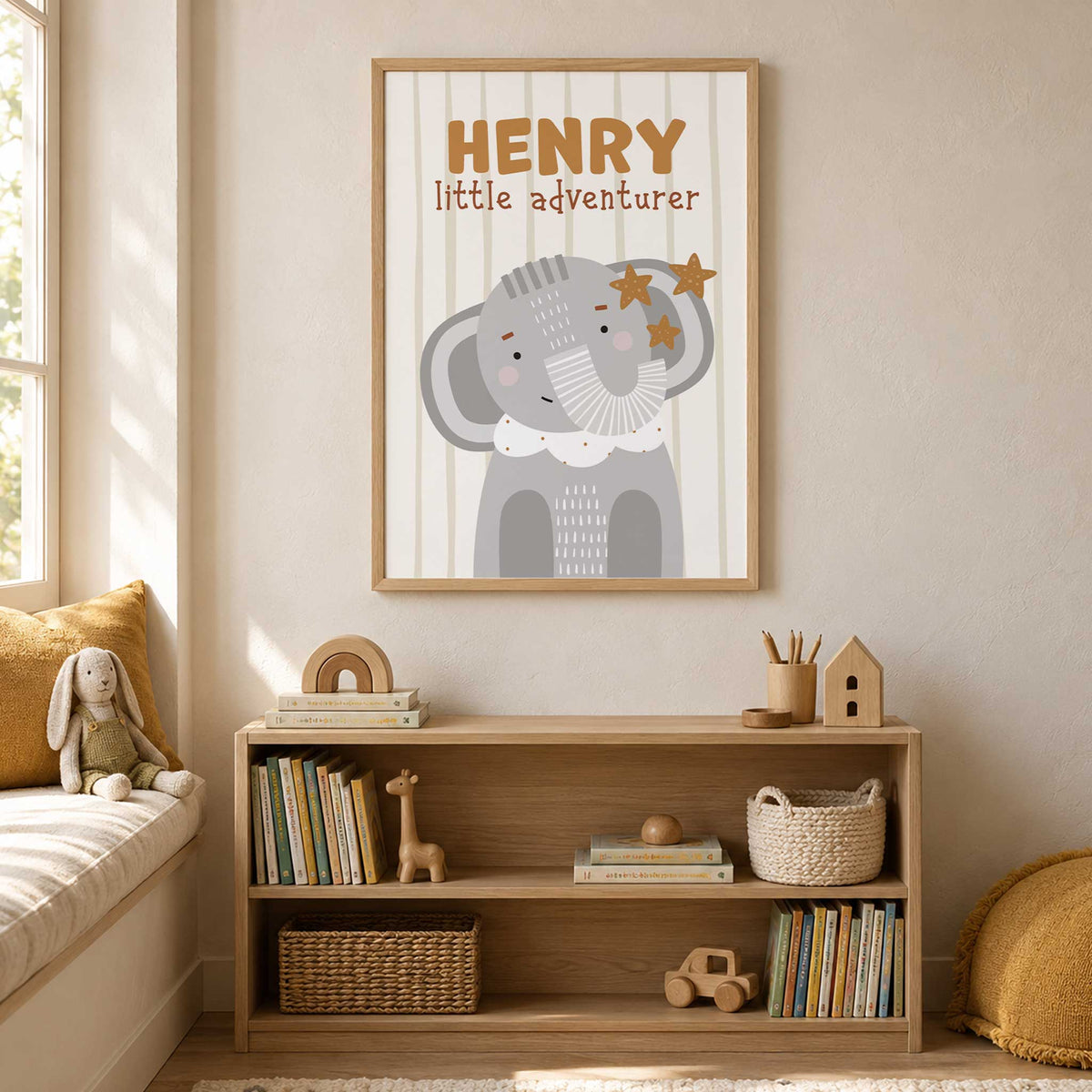 Personalised elephant safari wall art with child’s name, little adventurer wording and striped background for a kids room.