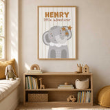 Personalised elephant safari wall art with child’s name, little adventurer wording and striped background for a kids room.