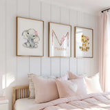 Personalised elephant and lion nursery prints with floral name artwork for girls