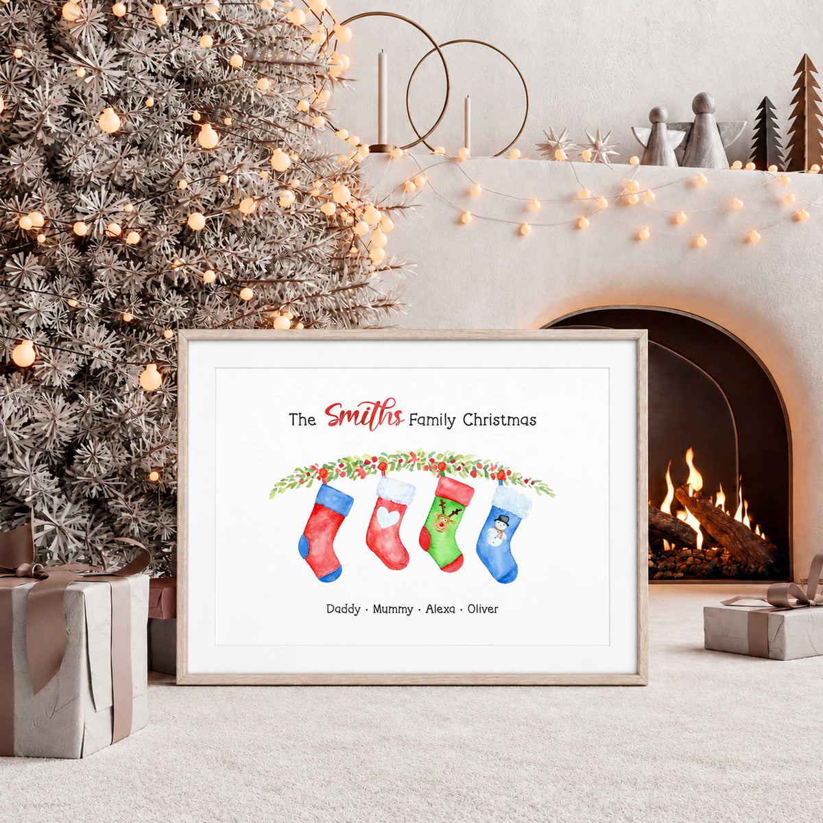 Personalised family Christmas print with four illustrated stockings, a festive garland, a custom family heading and four names