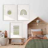 Three green prints featuring a smiling sun, personalised affirmations and dotted rainbow 
