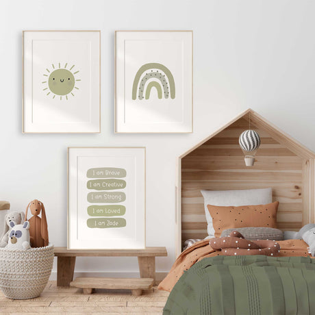 Three green prints featuring a smiling sun, personalised affirmations and dotted rainbow 