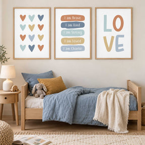 Set of three personalised kids prints featuring multicoloured hearts, positive I am affirmations and LOVE lettering.