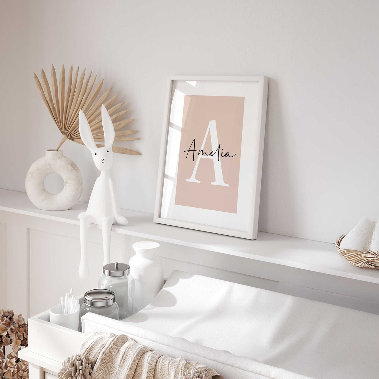 Personalised initial and name wall art with large letter and script name on neutral peach background