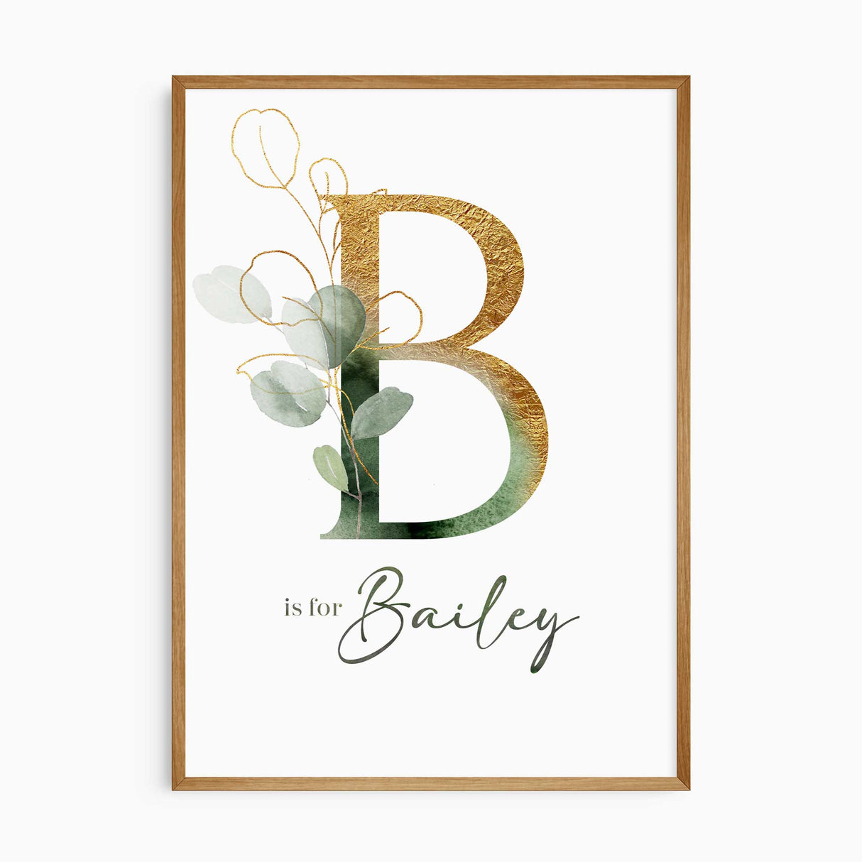 Personalised initial nursery print with green eucalyptus foliage, gold details and child’s name.