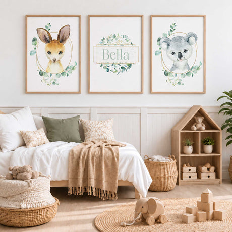 Personalised koala and kangaroo print set with eucalyptus greenery, gold-coloured outlines and a custom name print.