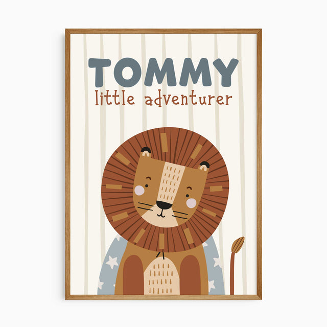 Personalised lion safari print with child’s name, little adventurer wording and a softly striped nursery background.