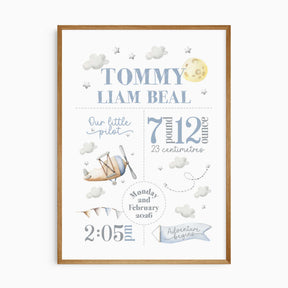 Personalised little pilot birth print with a vintage aeroplane, moon, clouds and baby’s name, date, time, weight and length