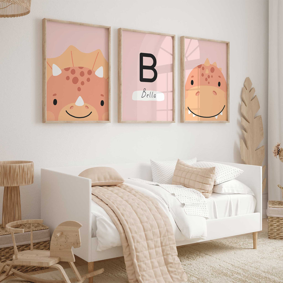 Set of three personalised pink dinosaur prints with two dinosaurs and a custom initial and child’s name