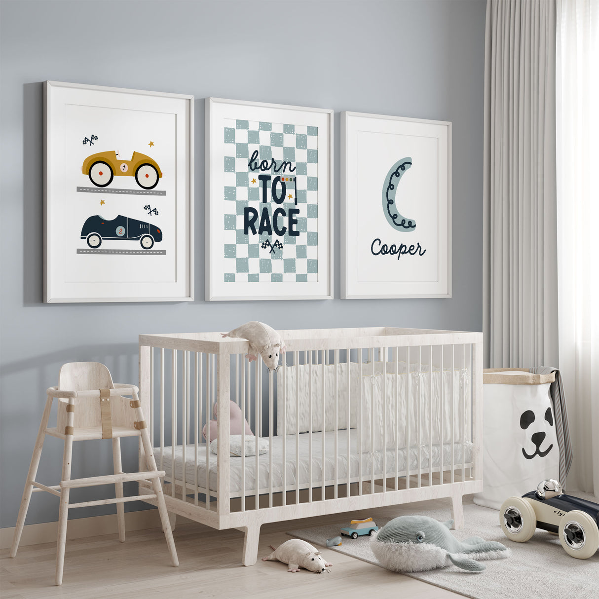 Personalised race car nursery wall art set with vintage car prints, checkered quote art and a custom name print in blue tones for boys bedroom decor