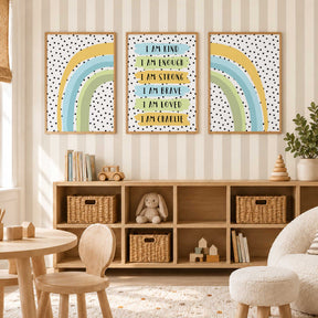 Personalised set of three kids affirmation prints with blue, green and yellow rainbows, black dots and encouraging words.