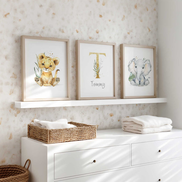 Personalised safari nursery wall art set of three with lion elephant and initial print