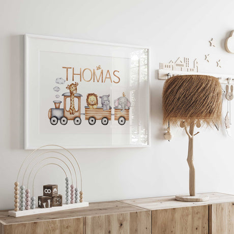 Personalised nursery print with name above a wooden-style train carrying four safari animals, with clouds and small birds.