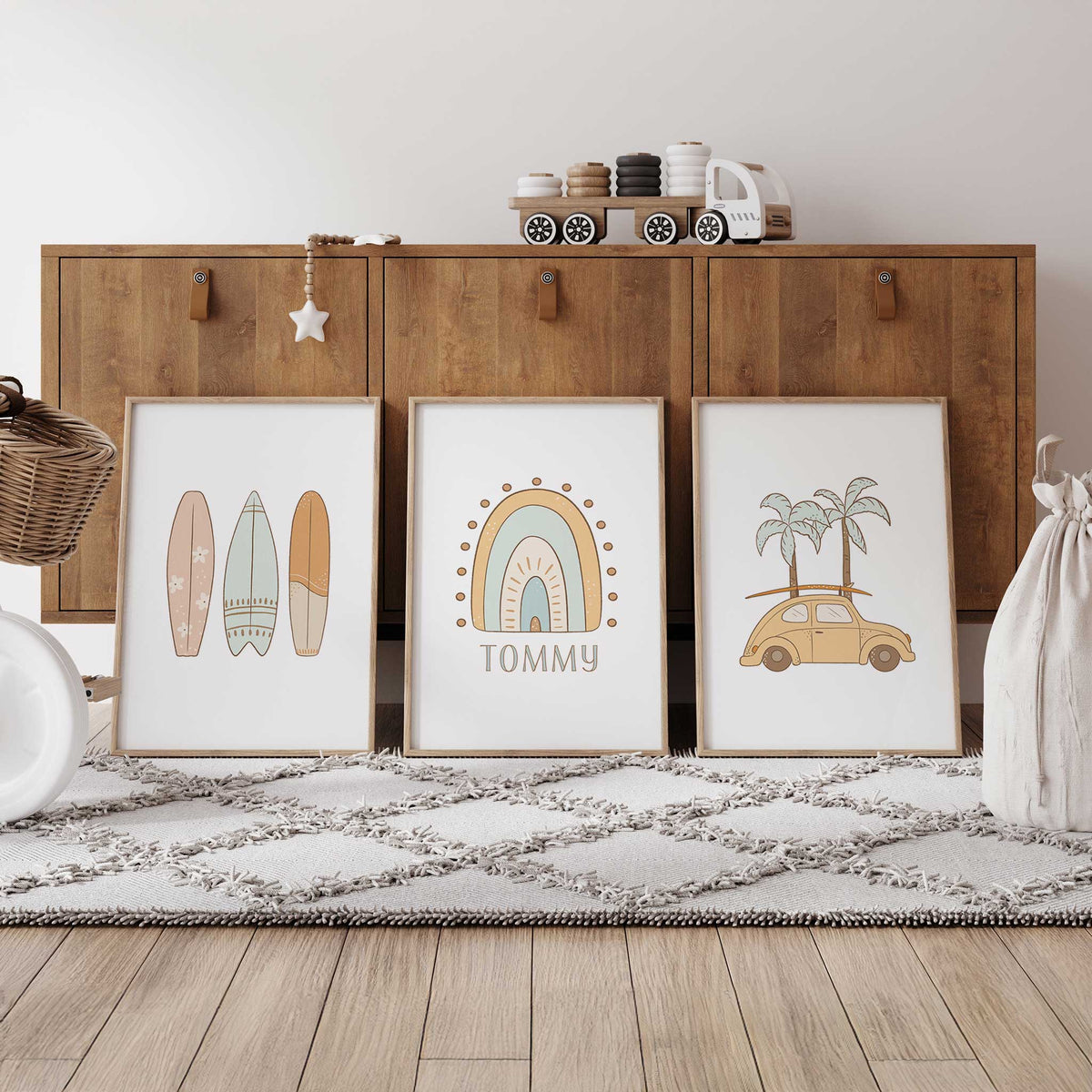 Set of three personalised surf prints with pastel surfboards, a rainbow with name underneath and a yellow beach car with palm trees.