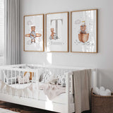 Three teddy bear prints with a pilot, sailing bear and grey initial with name, illustrated in brown and grey.