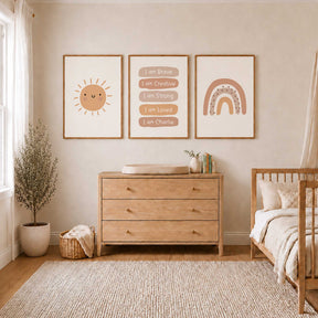 Set of three terracotta prints featuring a smiling sun, dotted rainbow and personalised positive I am affirmations.