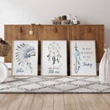 Three framed wall art prints with bohemian-style tribal illustrations and text  The prints feature a feathered headdress, a dreamcatcher, and feathers with motivational phrases like 'BE Brave', 'DREAM BIG little one', and 'BE KIND BE STRONG BE YOU