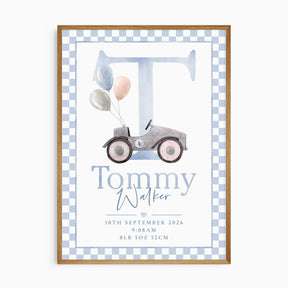 Personalised birth print with a blue watercolour letter vintage ride-on car, balloons, birth details and blue chequered border.