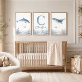 Personalised ocean print set of three with a blue whale, dolphin, sandy fish and a initial and the childs name.