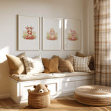 Set of three farm animal prints featuring a pig, cow, and lamb in front of a wooden fence, ideal for farmhouse nursery or kids room wall decor.