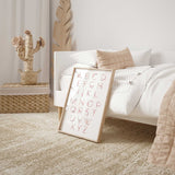 Pink ABC nursery print with floral rose gold lettering