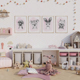 Four piece girls nursery wall art set featuring watercolour baby koala, kangaroo, platypus and wombat on soft pink backgrounds